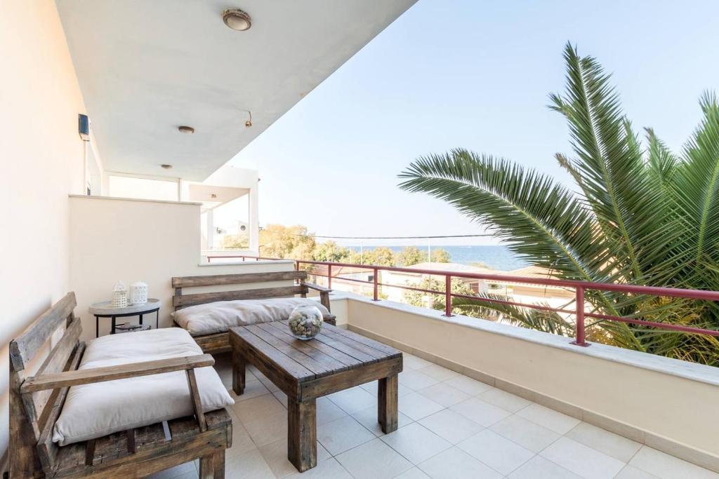 Private balcony with sea view at a Aegean Gate Stays beachfront apartment